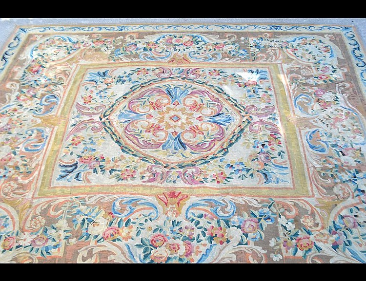 Appraisal: LARGE AUBUSSON CARPETFrench th Century The center oval with scrolls