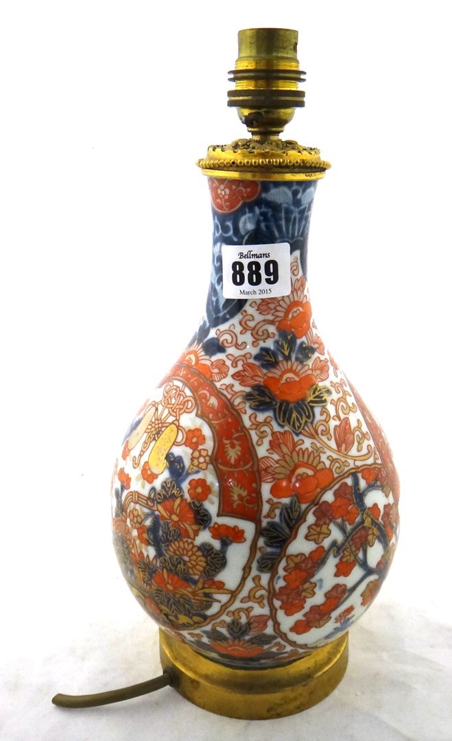 Appraisal: A Japanese Imari bottle vase Meiji period painted with panels