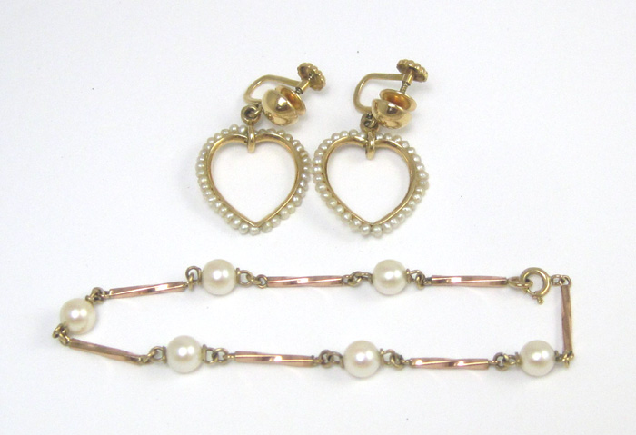 Appraisal: THREE ARTICLES OF PEARL JEWELRY including a pair of seed