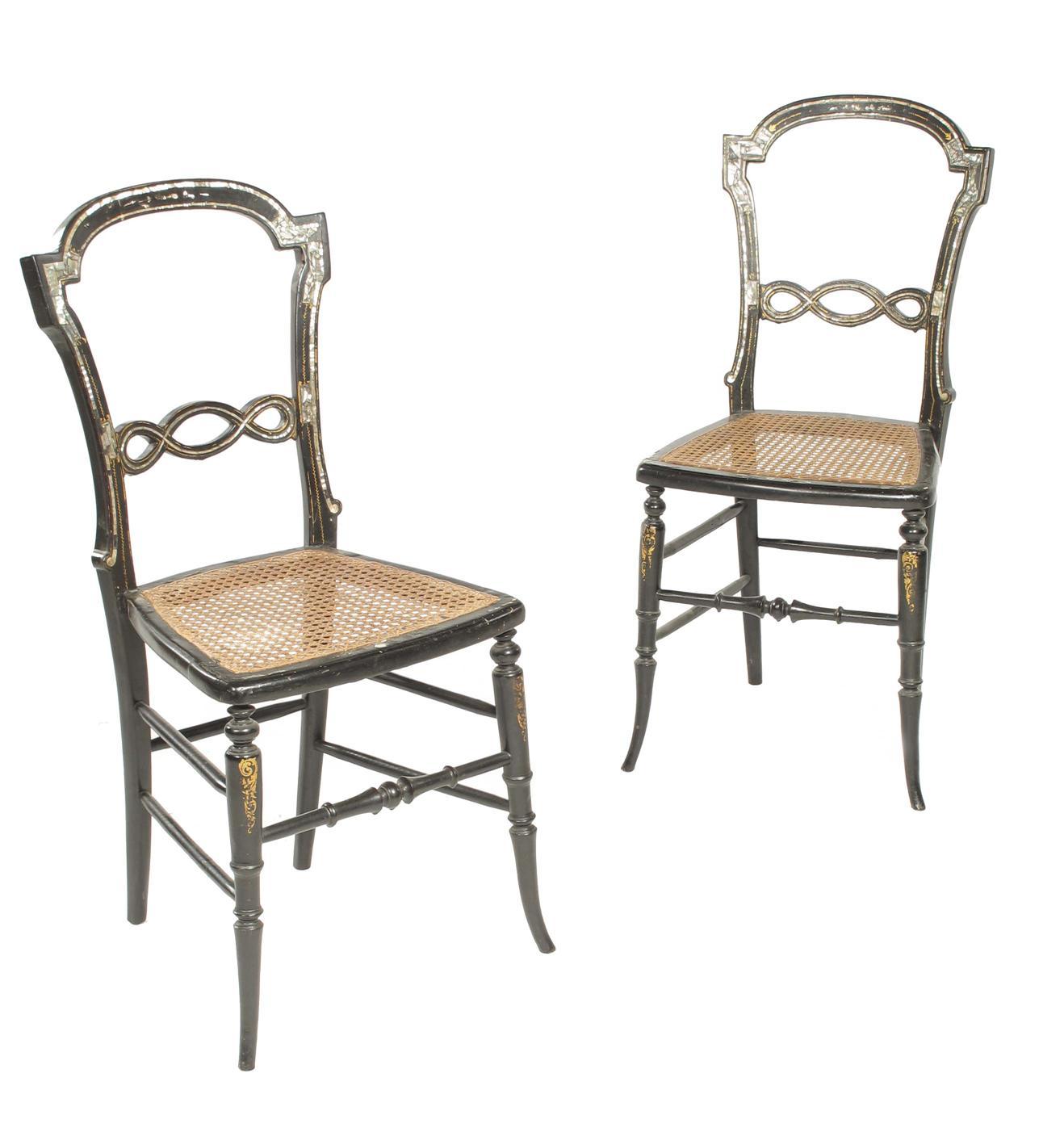 Appraisal: A pair of Victorian ebonised papier-mache side chairs