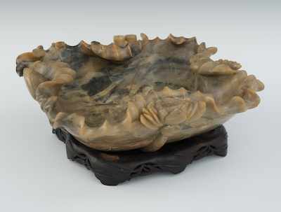 Appraisal: A Carved Soapstone Centerbowl on a Carved Wood Stand Deeply