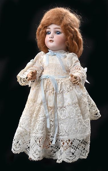 Appraisal: A JUTTA SIMON AND HALBIG BISQUE HEAD DOLL with pierced