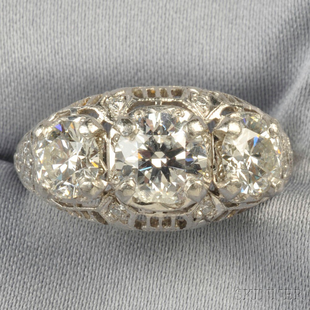 Appraisal: Platinum and Diamond Three-stone Ring set with three full-cut diamonds