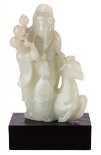 Appraisal: A CHINESE PALE CELADON JADE GROUP OF SHOU LAO AND