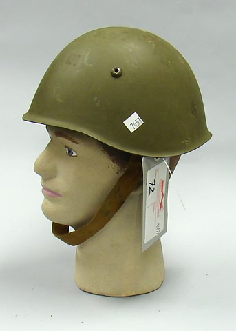 Appraisal: Lot consists of an Italian WWII combat helmet with liner