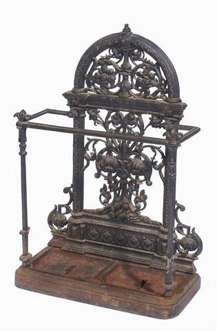 Appraisal: A Victorian cast iron stick stand the arching back with