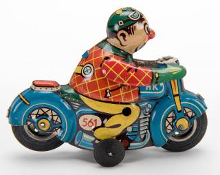 Appraisal: Flip-Over Motorcycle Germany Huki mid-twentieth century Colorful tin litho motorcycle