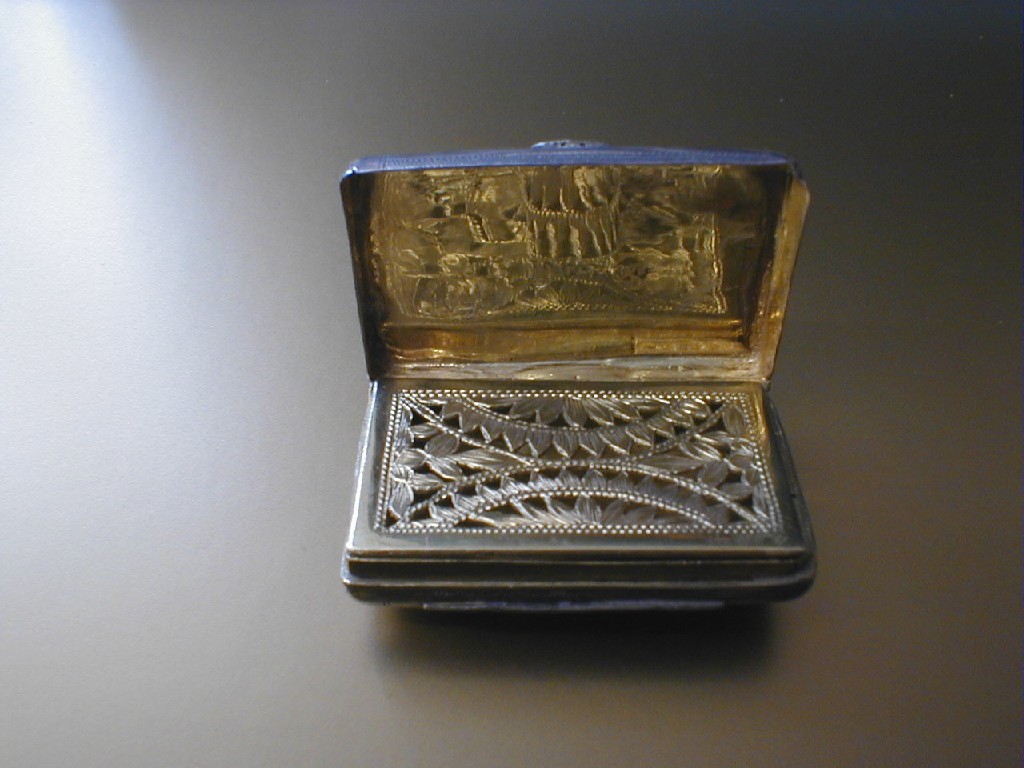 Appraisal: A George IV silver gilt vinaigrette the rectangular case modelled