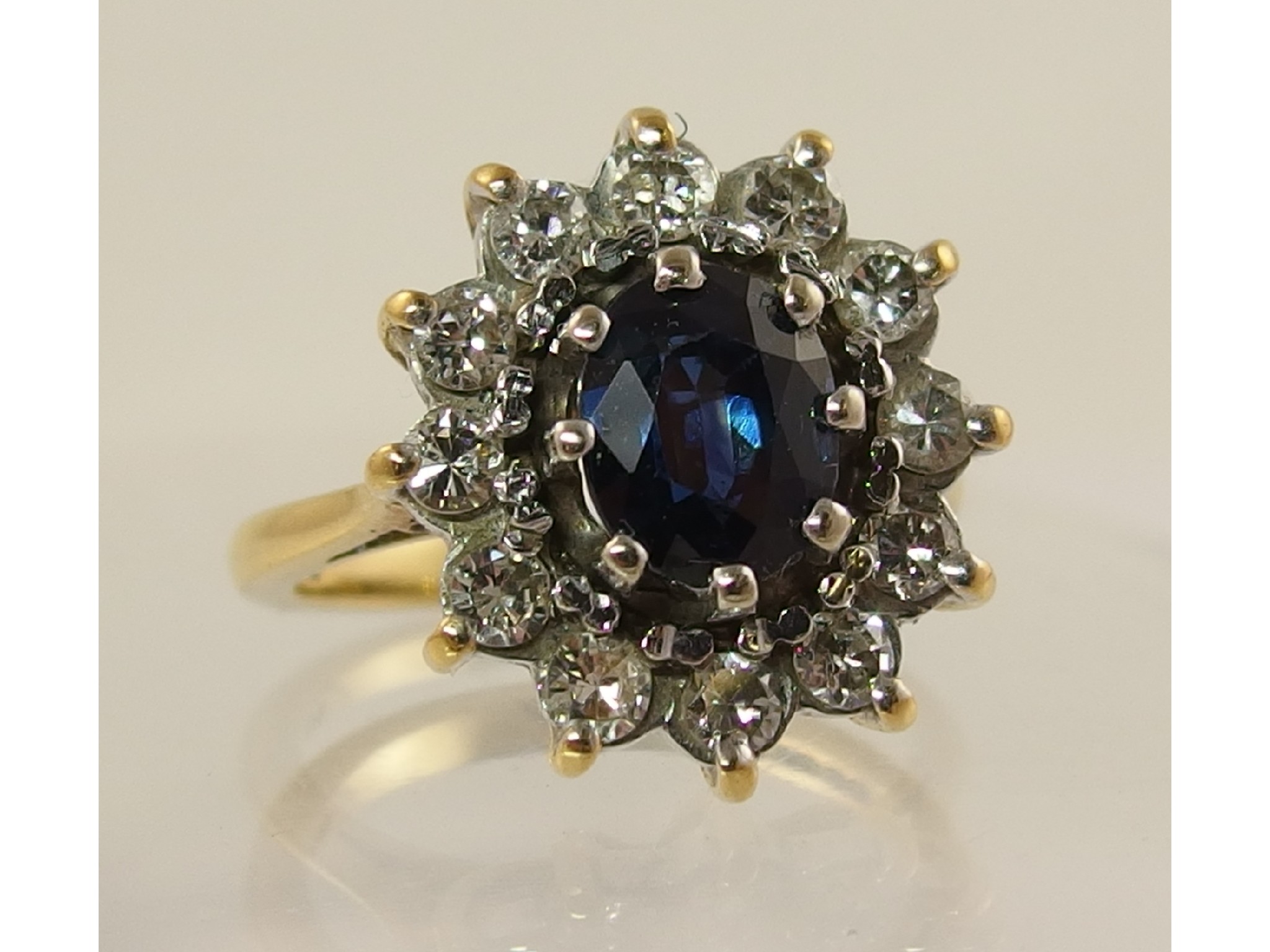 Appraisal: An ct sapphire and diamond ringthe central oval facet cut