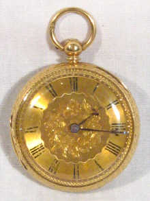 Appraisal: An carat gold open face pocket watch with finely engraved