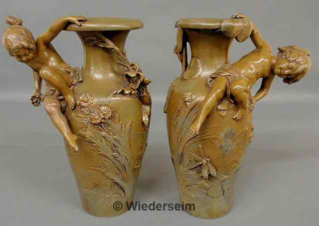 Appraisal: Pair of French faux bronze spelter metal vases signed Auguste