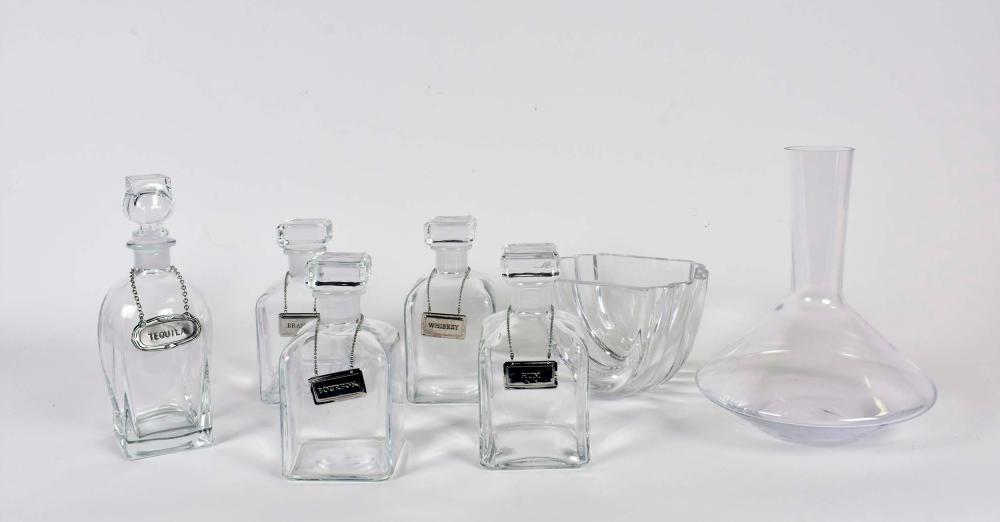 Appraisal: SIX COLORLESS GLASS DECANTERS A BOWL th Century Comprising a