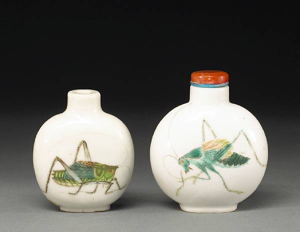 Appraisal: Two enamel-decorated porcelain snuff bottles Each of compressed globular form