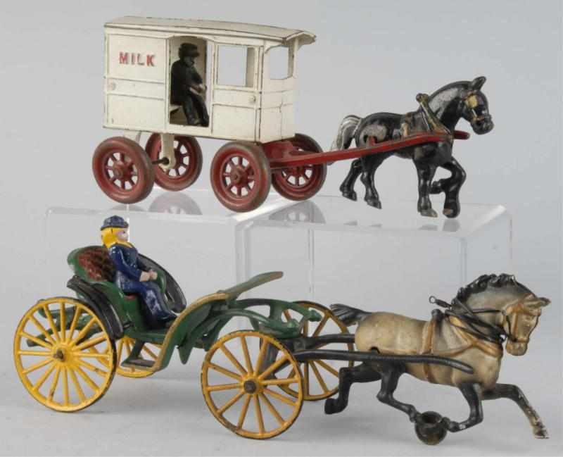 Appraisal: Lot of Cast Iron Horse-Drawn Toys Description American Circa s