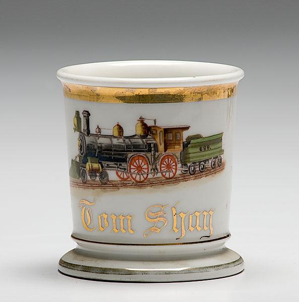 Appraisal: RAILROAD ENGINEER'S OCCUPATIONAL SHAVING MUG porcelain with polychrome painted scene