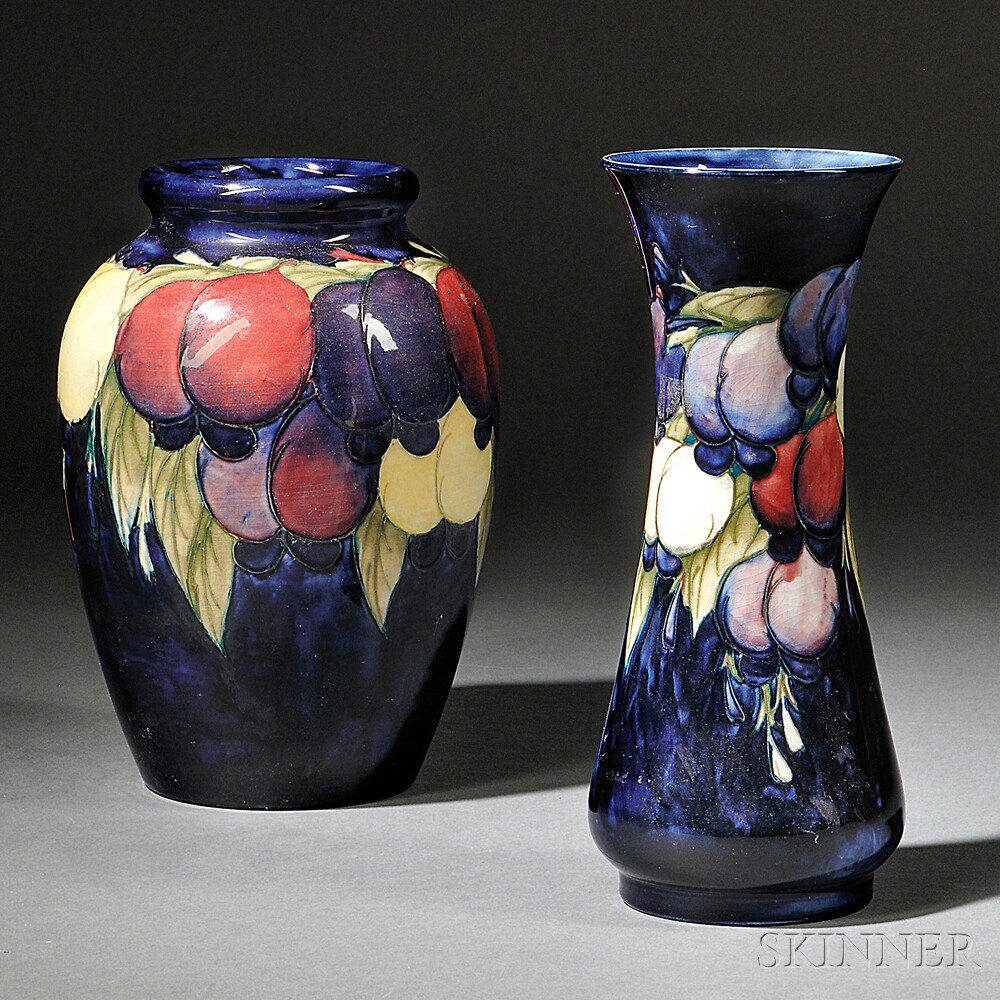 Appraisal: Two Moorcroft Pottery Plum Vases England - One with rolled