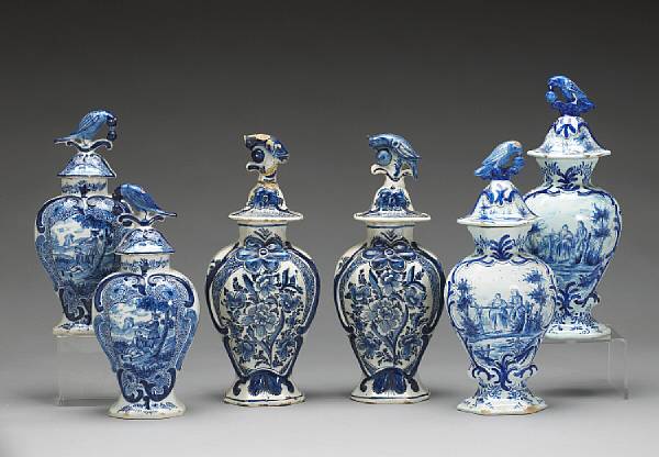 Appraisal: Three pairs of Dutch blue and white Delft covered baluster