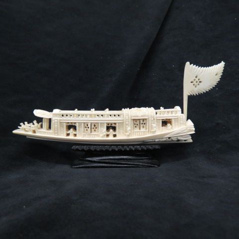 Appraisal: Chinese Carved Ivory Boat elaborate detail long with stand