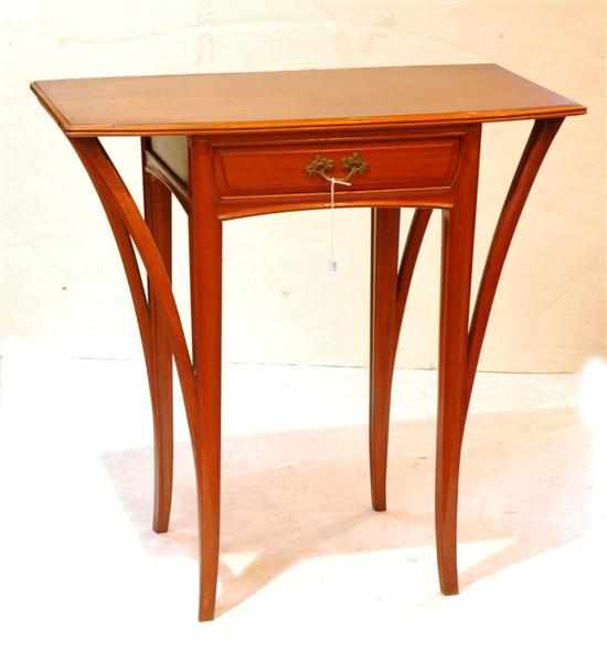 Appraisal: An Art Nouveau fruit wood side table The shaped rectangular