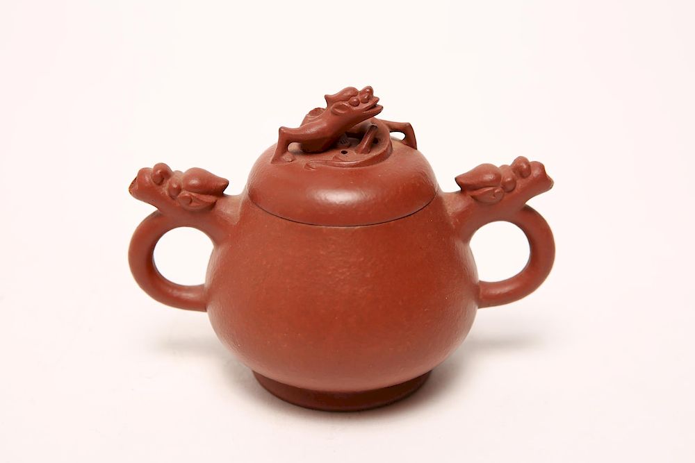 Appraisal: Chinese Yixing Ceramic Teapot with Chiwen Chinese Yixing dark red