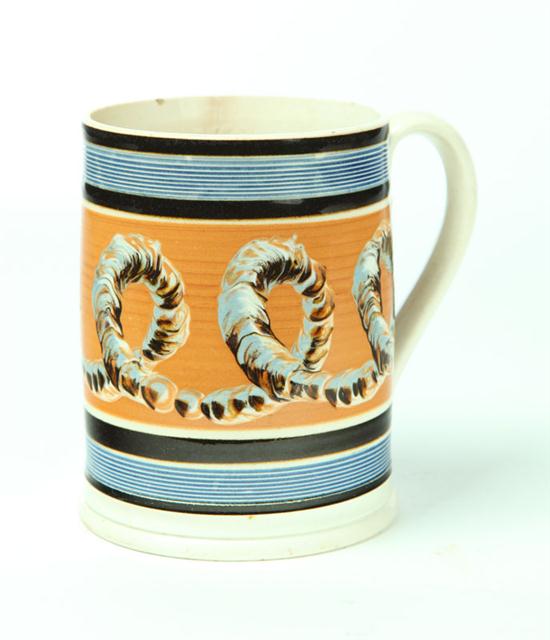 Appraisal: MOCHA MUG England st quarter- th century Earthworm design on