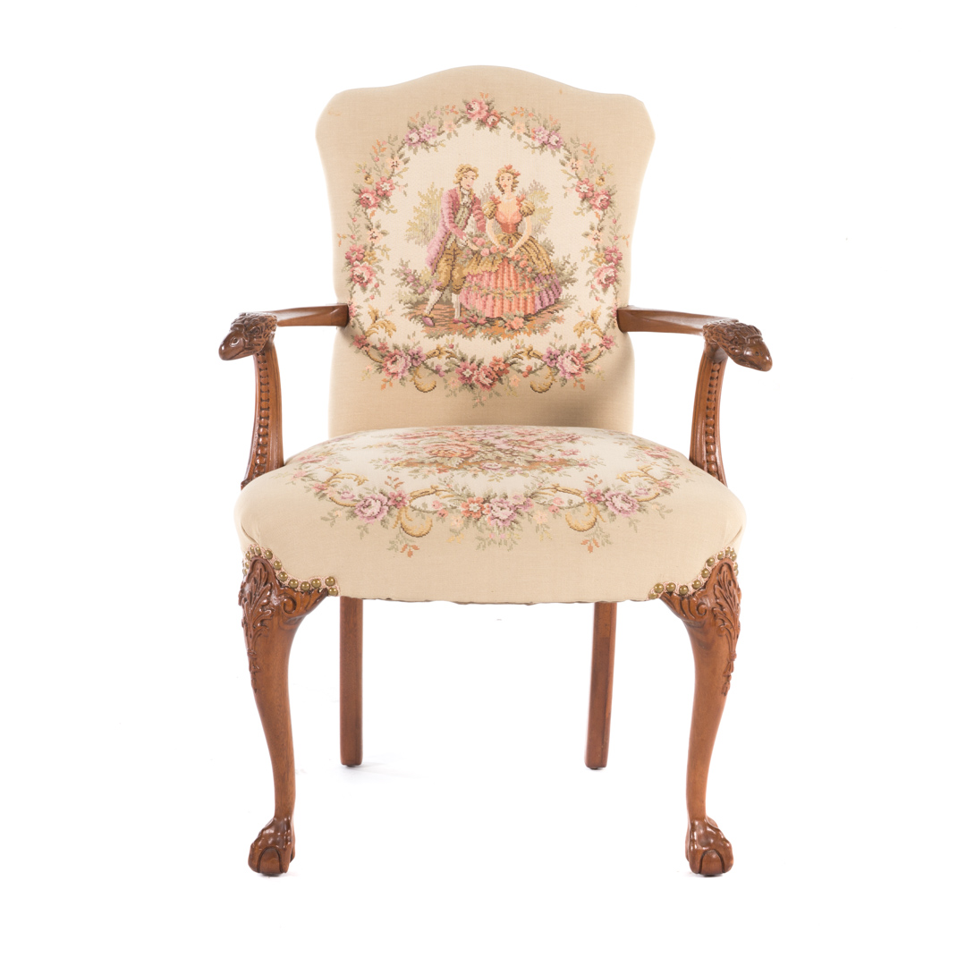 Appraisal: Chippendale style mahogany armchair eagle-head carved arms upholstered seat and