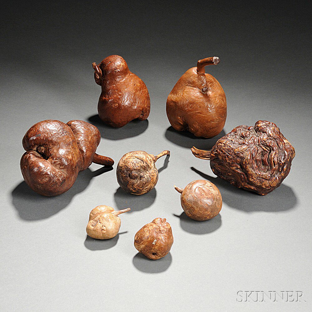 Appraisal: Eight Pieces of Carved Burl Fruit early th century with