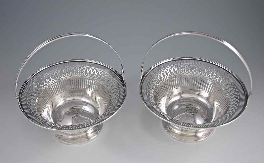 Appraisal: PAIR OF WATSON STERLING RETICULATED BASKETS Matched pair with pierced