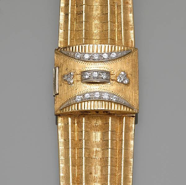 Appraisal: A lady's k gold bracelet watch with diamond set cover