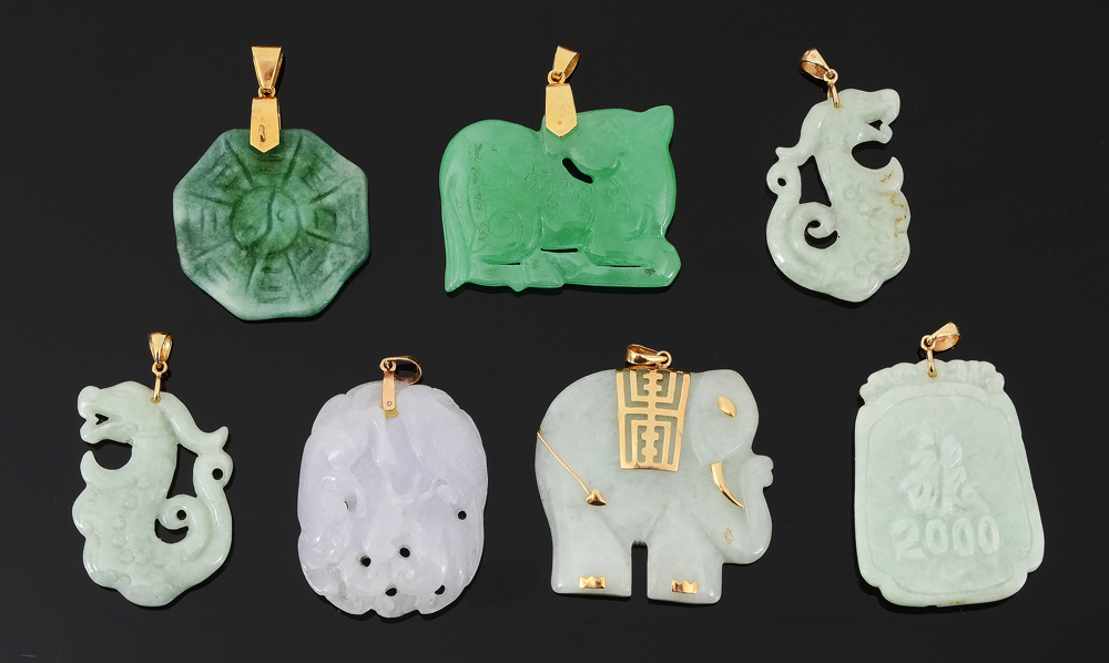 Appraisal: GROUP OF CARVED JADEITE JADE PENDANTS Estate found group of