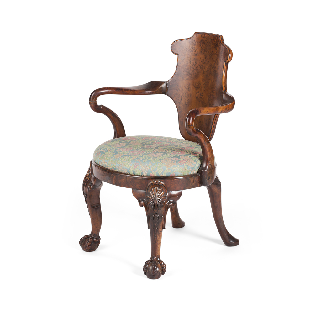 Appraisal: GEORGE II STYLE YEW WOOD LIBRARY ARMCHAIR CIRCA the shield