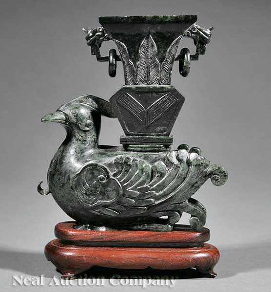 Appraisal: An Archaistic Chinese Carved Spinach Green Jade Phoenix Vase the