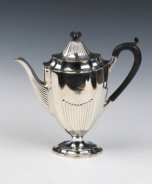 Appraisal: A LATE VICTORIAN SILVER COFFEE POT with fluted lower body