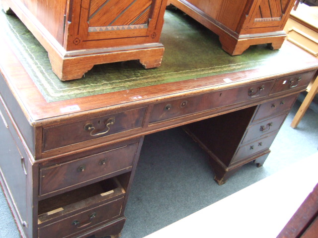 Appraisal: A th century mahogany pedestal desk the gilt tooled green