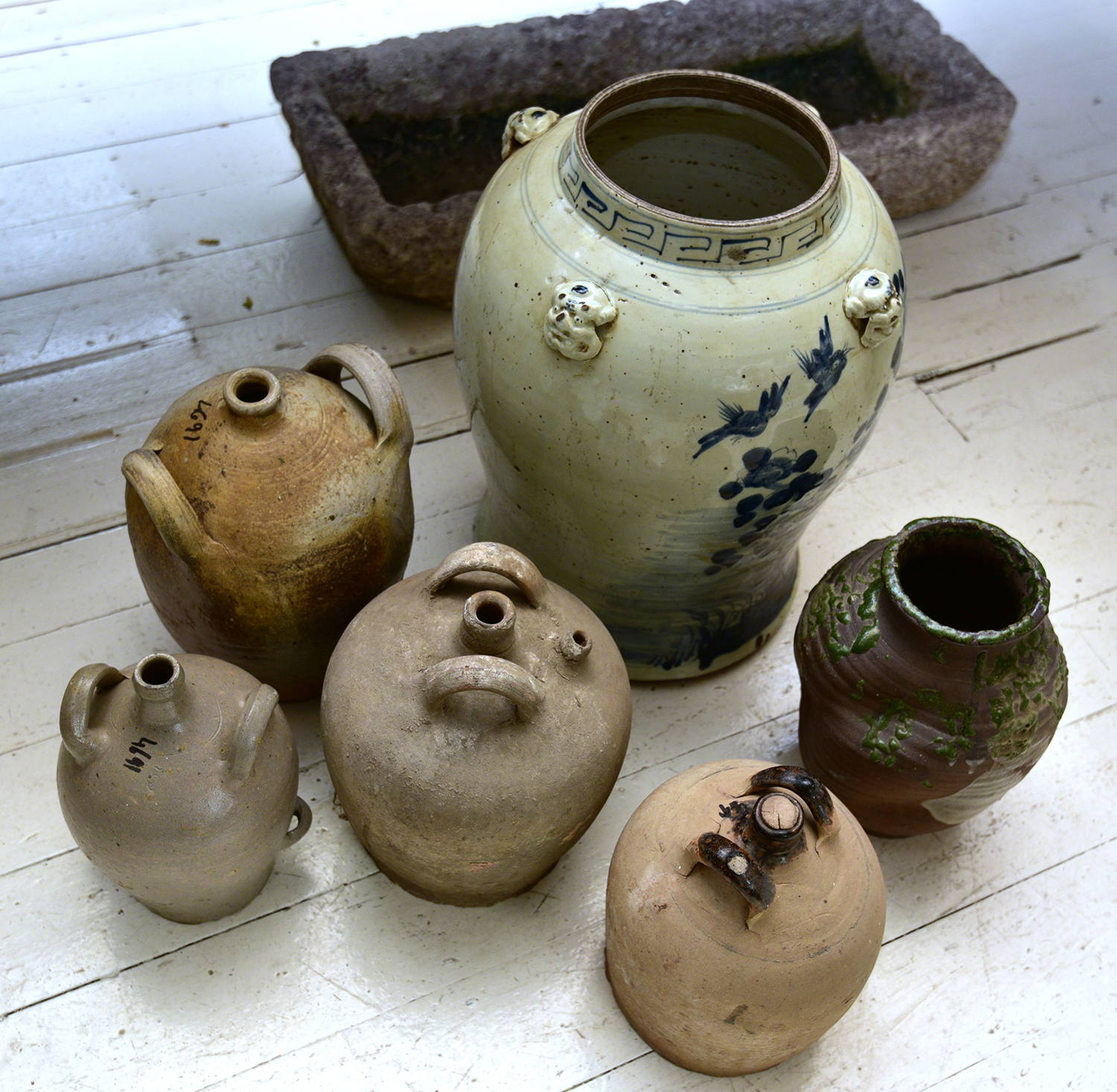 Appraisal: A CHINESE GLAZED GINGER JAR FOUR CERAMIC FLASKS AND A