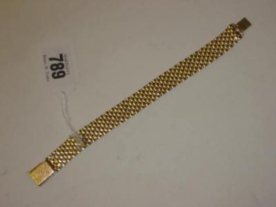 Appraisal: A CT GOLD BRACELET of watch strap form long g