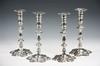 Appraisal: CANDLESTICKS - Set of matching Irish silver candlesticks with petal