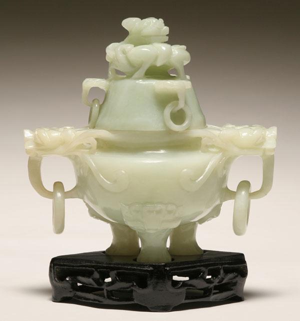 Appraisal: Chinese carved jade censor on tripod foot with coiled dragon