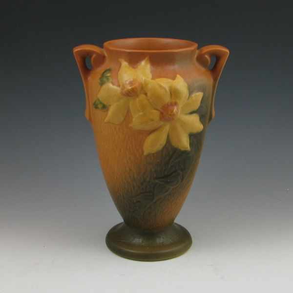 Appraisal: Roseville Clematis handled vase in brown Marked Roseville USA -