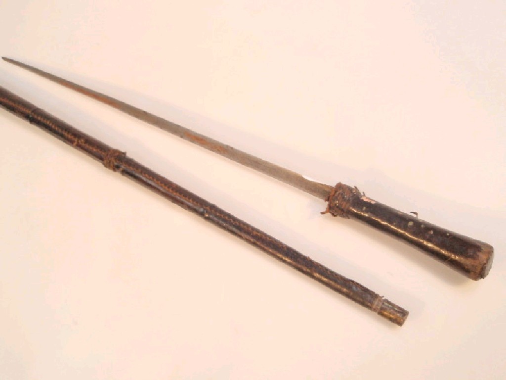 Appraisal: An antique leather bound sword stick