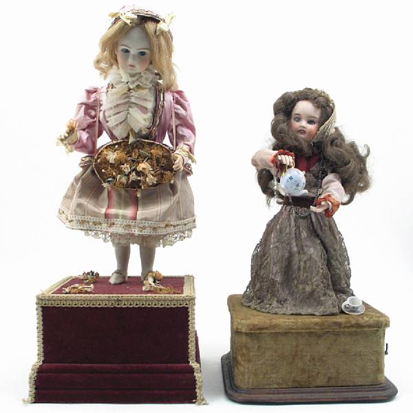 Appraisal: A group of two French bisque and composition automaton dolls