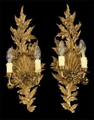 Appraisal: A pair of craved giltwood and gesso twin branch wall