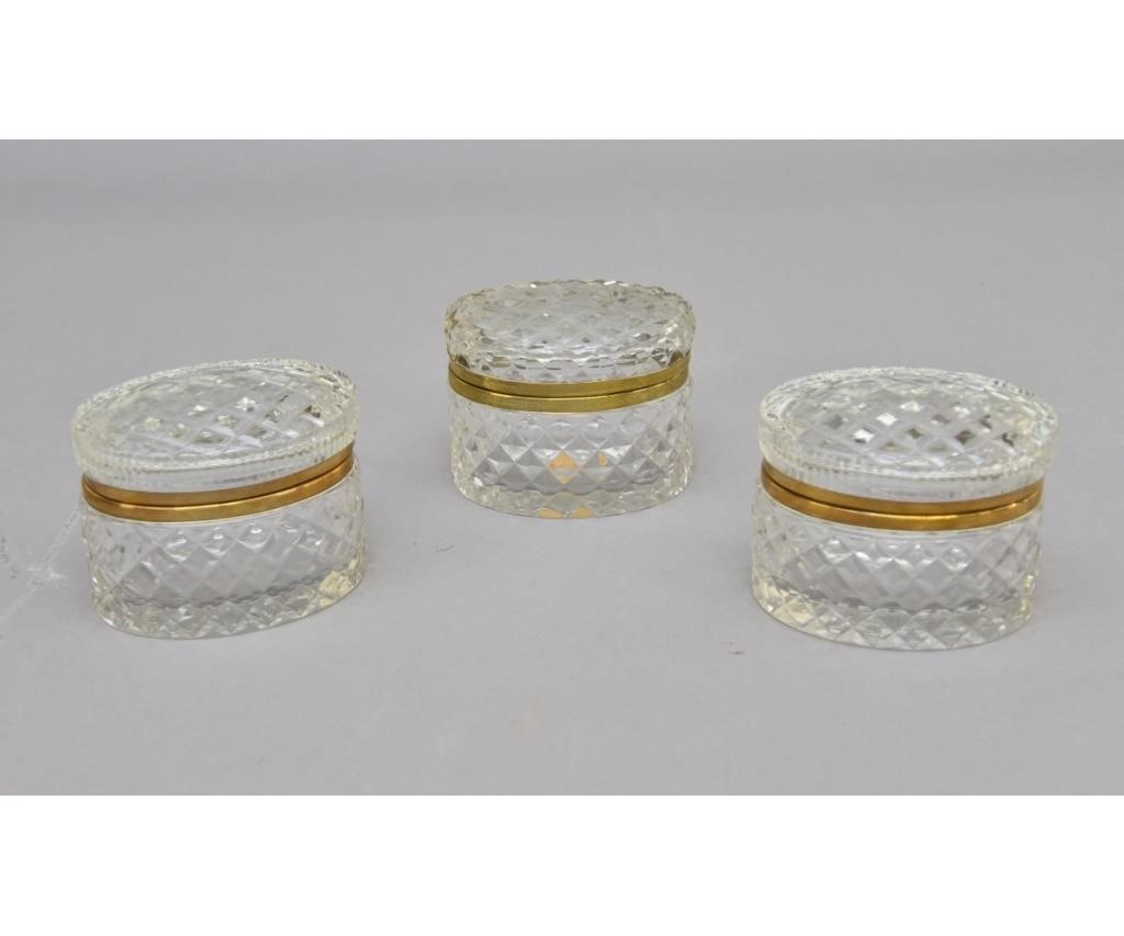 Appraisal: Pair of French Crystal oval boxes together with a similar