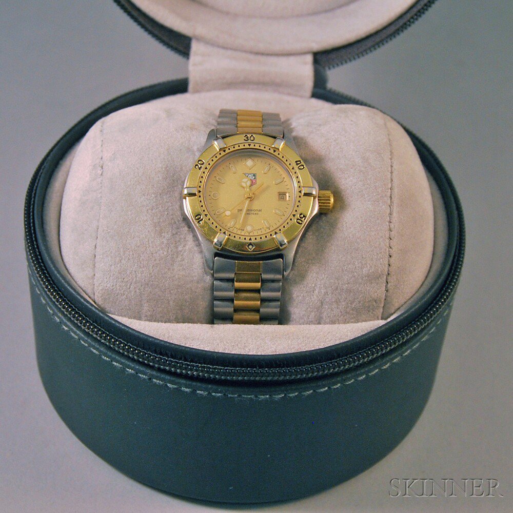 Appraisal: Lady's Tag Heuer R Professional Gold-plated and Stainless Steel Wristwatch