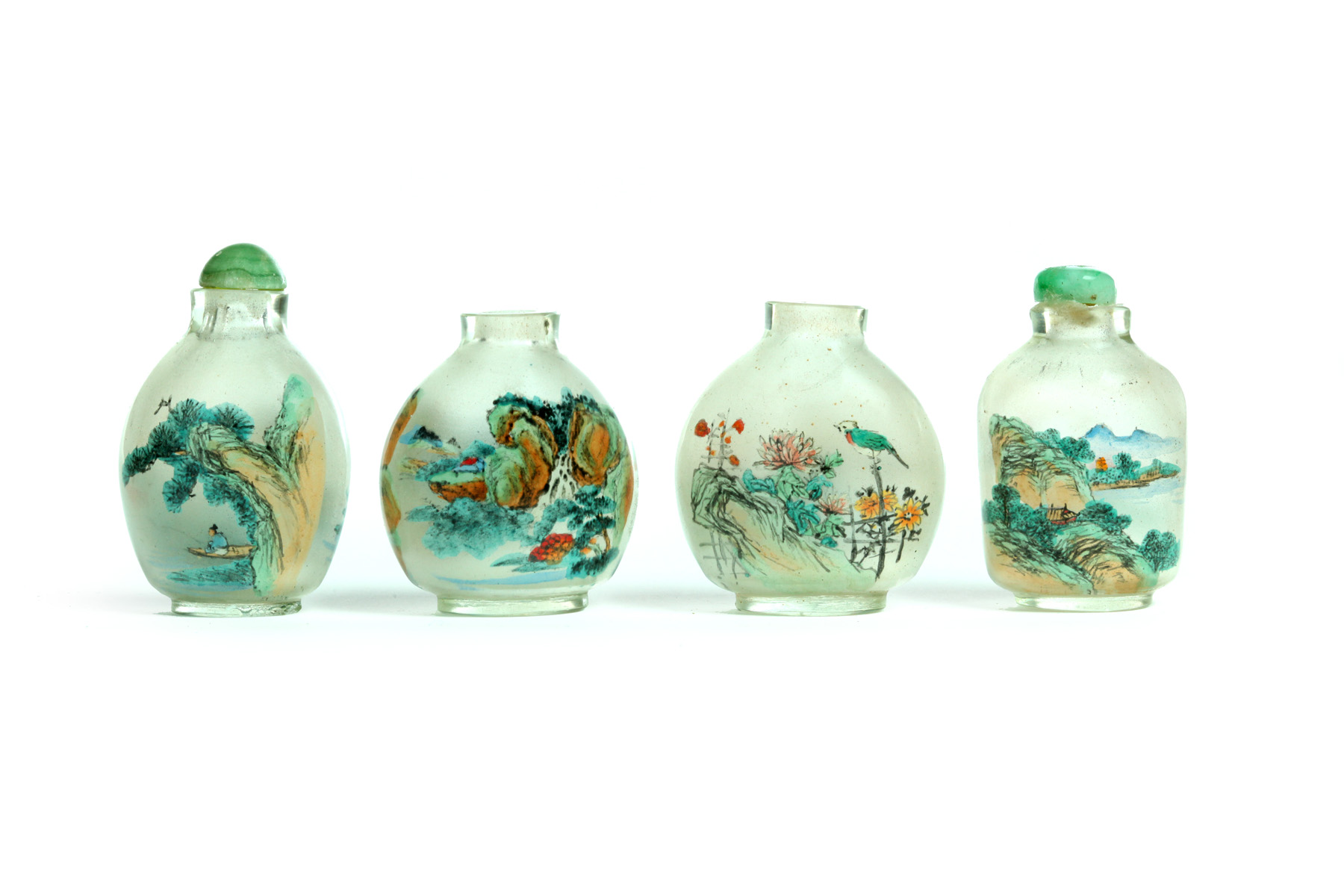 Appraisal: FOUR SNUFF BOTTLES China th century Colorful reverse glass painted