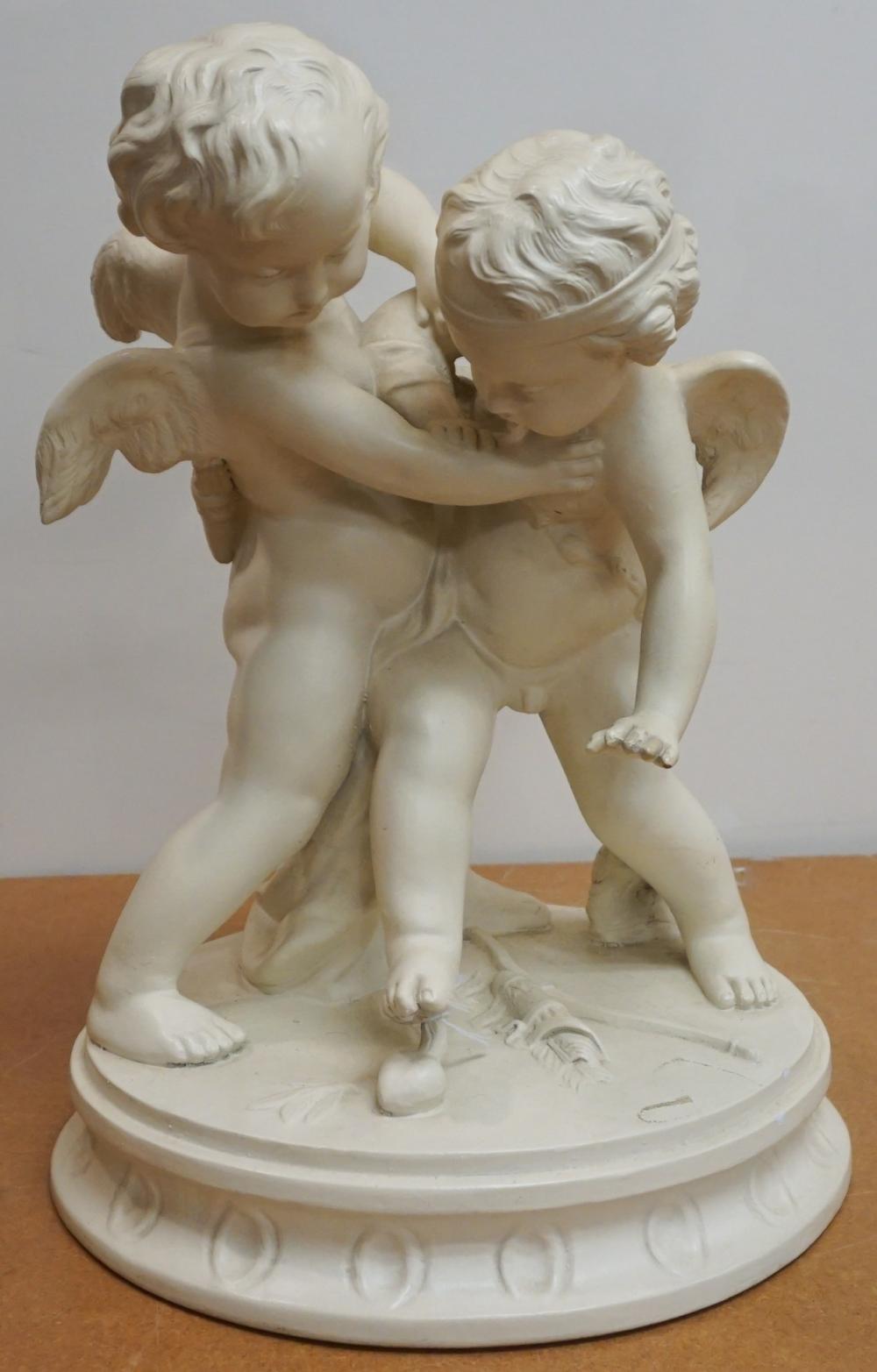 Appraisal: White Painted Ceramic Figure of Fighting Putti H in cm