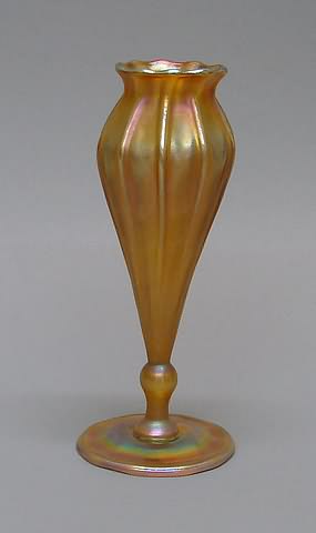 Appraisal: Gold ribbed vase with flaring lip circular base incised under