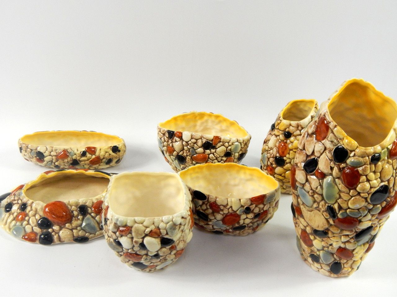 Appraisal: A group of Sylvac pebble vases and planters impressed marks