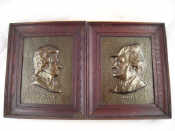 Appraisal: A pair of bronzed plaques depicting Wagner and Mozart in