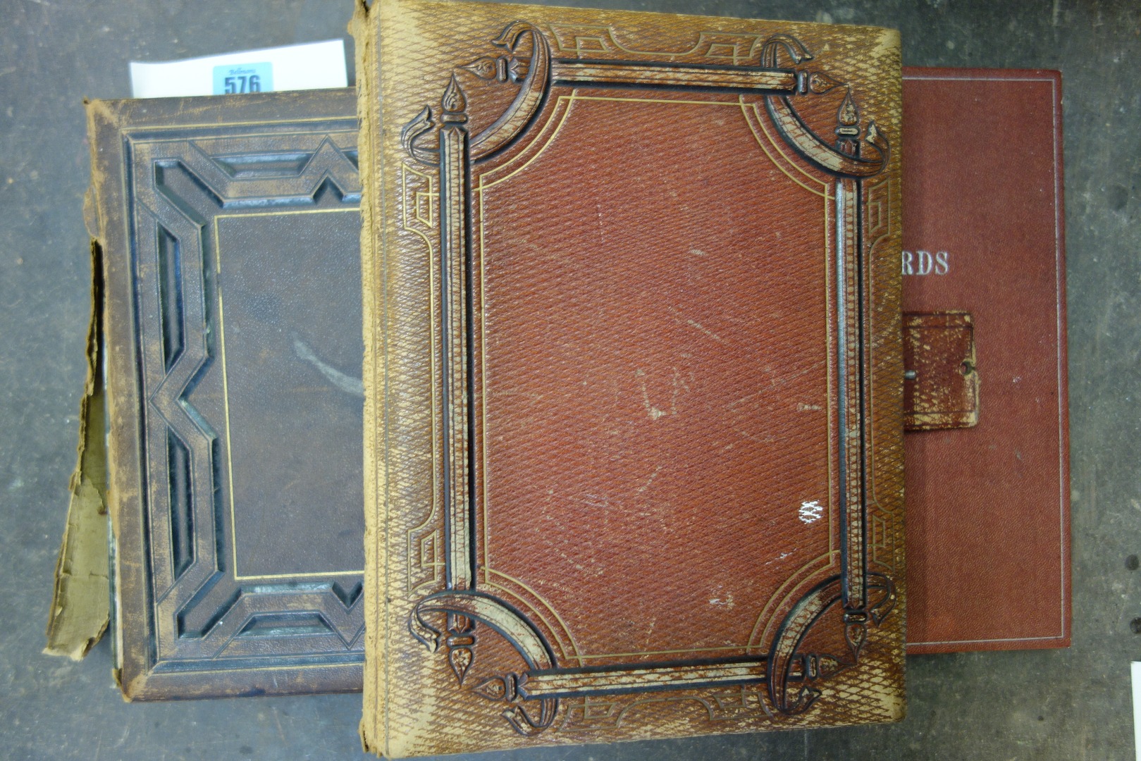 Appraisal: Two Victorian empty leather bound photograph albums three wooden printing